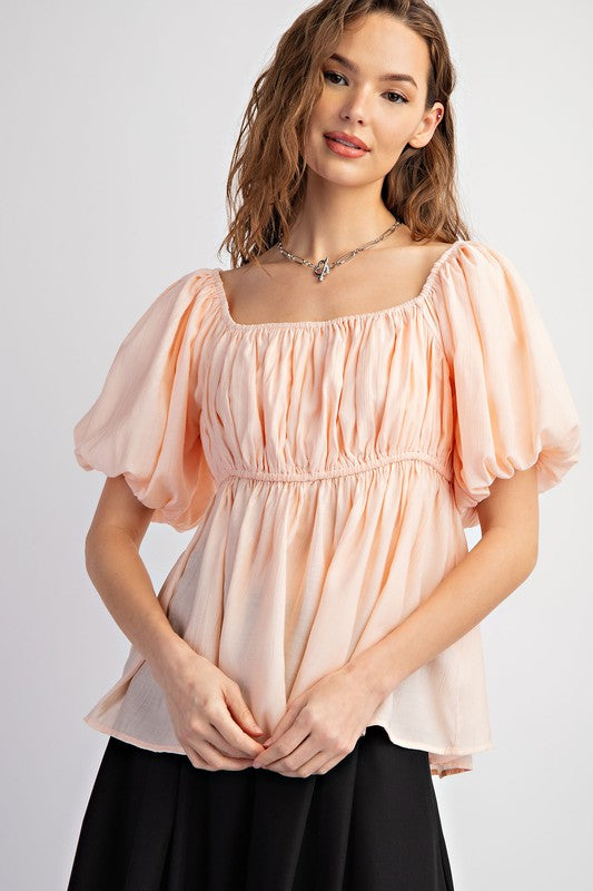 PEACH BOAT NECKLINE AND RUCHED TOP